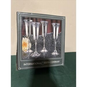 International Silver Company  four silver-plated stemmed  in their original box.
